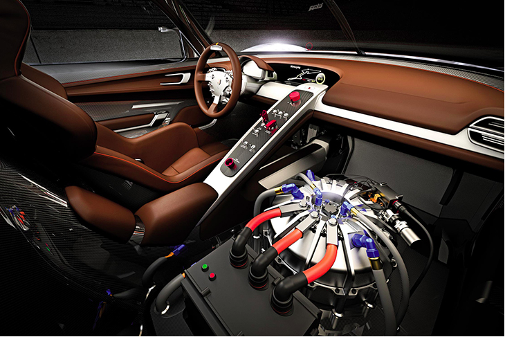 图为安装在汽车驾驶员座位旁边的动能回收系统飞轮的照片。