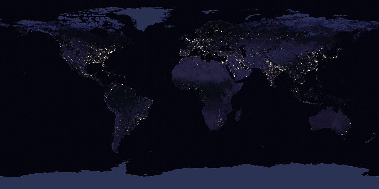Dots of light across the globe are shown where larger cities are located.