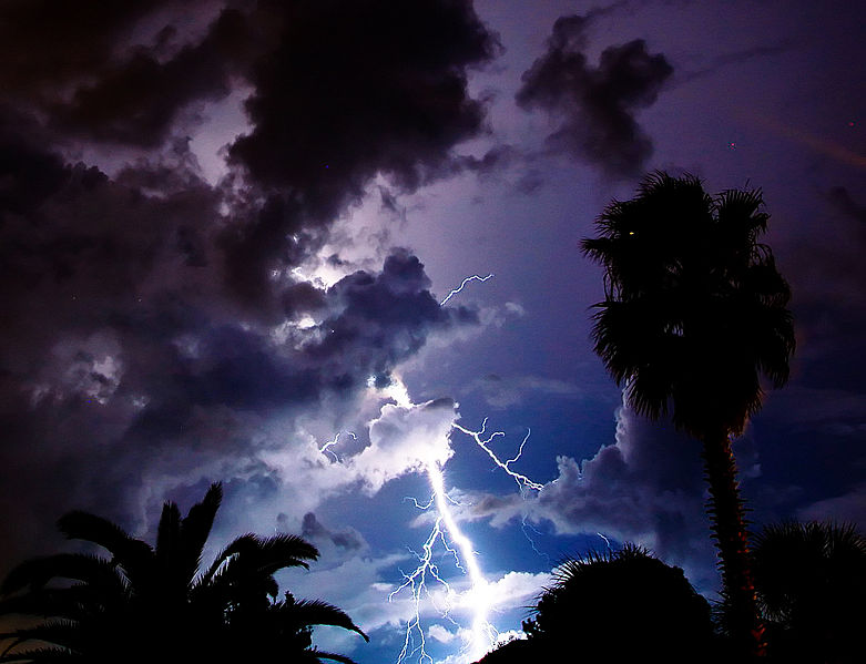Lightning is shown in the sky.