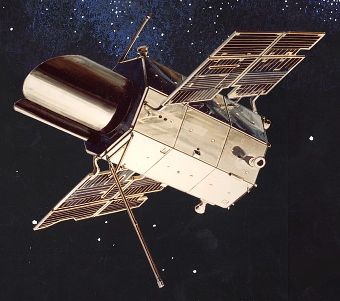 Artist’s concept of the Orbiting Astronomical Observatory in orbit appears as a large main vessel with 4 solar panels on each side.