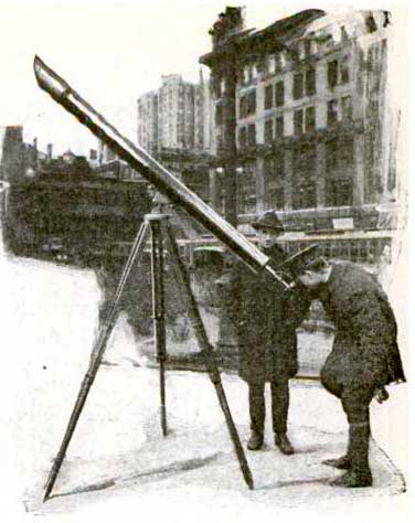 On forty-second street in New York, Joseph G. White shows the new comet or the planets through his 4 ½ inch refracting telescope.