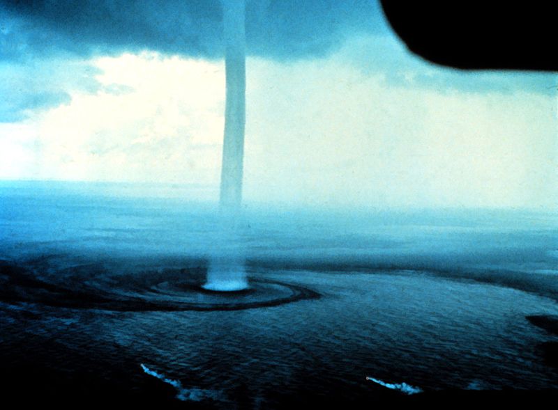 a narrow waterspout is shown.
