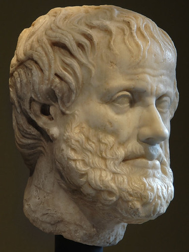 "Head of Aristotle. Vienna, Museum of Art History, Collection of Classical Antiquities." by Sergey Sosnovskiy is licensed under CC BY-SA 2.0; 