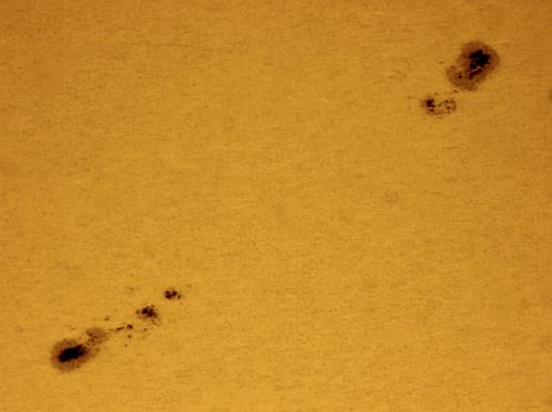 The existence of sunspots challenged the assumption that the Sun and other celestial objects were perfect and unblemished. "Sunspots" by David St. Louis is licensed under CC BY 2.0; 
