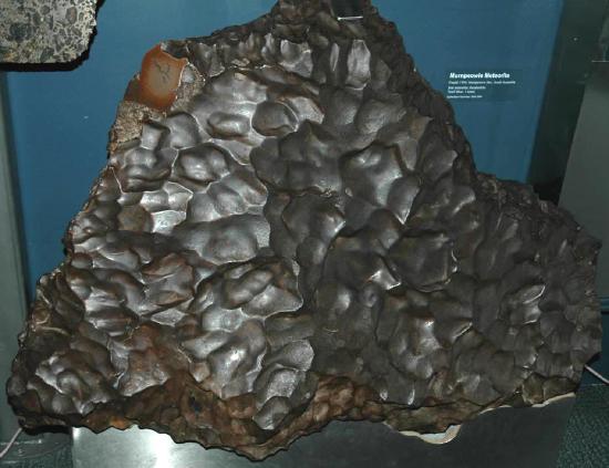 A meteorite. https:/commons.wikimedia.org/wiki/File:Murnpeowie_meteorite.jpg; 