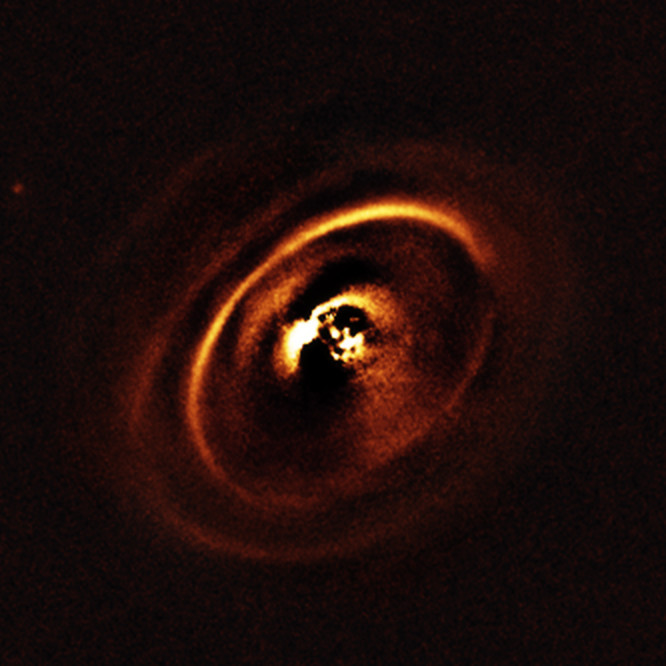 This image of the star Beta Pictoris shows evidence of a protoplanetary disk. https:/commons.wikimedia.org/wiki/File:Protoplanetary_disk_of_RX_J1615_(eso1640b).jpg; 