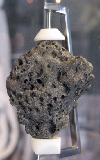 Lunar rock samples like this one from the Apollo 11 mission have enabled us to calculate the age of the Earth-Moon system through radiometric dating. https:/commons.wikimedia.org/wiki/File:Apollo_11_moon_rock,_sample_10072,80.jpg; 