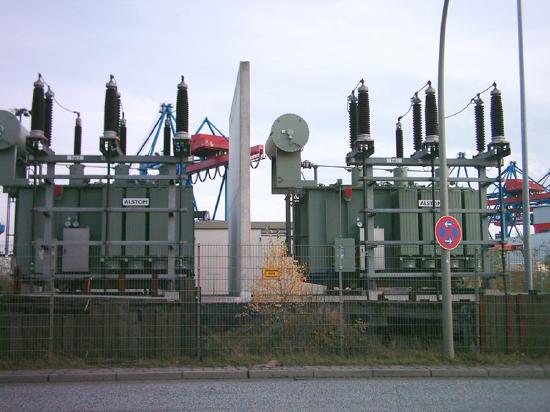 does dc travel further than ac Photograph of transformers installed in transmission lines.