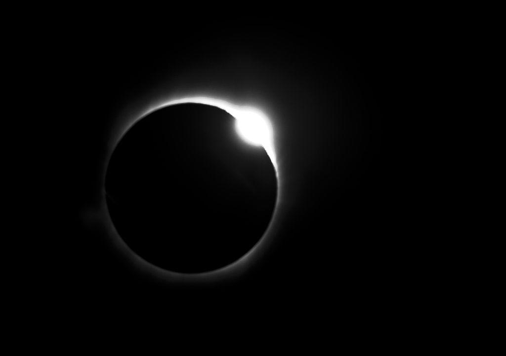 A total solar eclipse which creates a diamond ring in the sky.