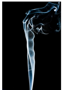 Figure is a photo of smoke that rises smoothly at the bottom and forms swirls and eddies at the top.