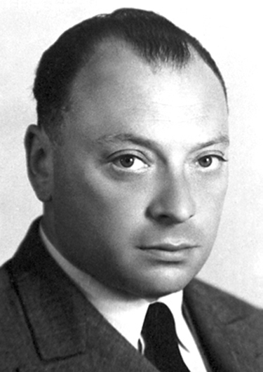 A black and white portrait of Austrian physicist Wolfgang Pauli.